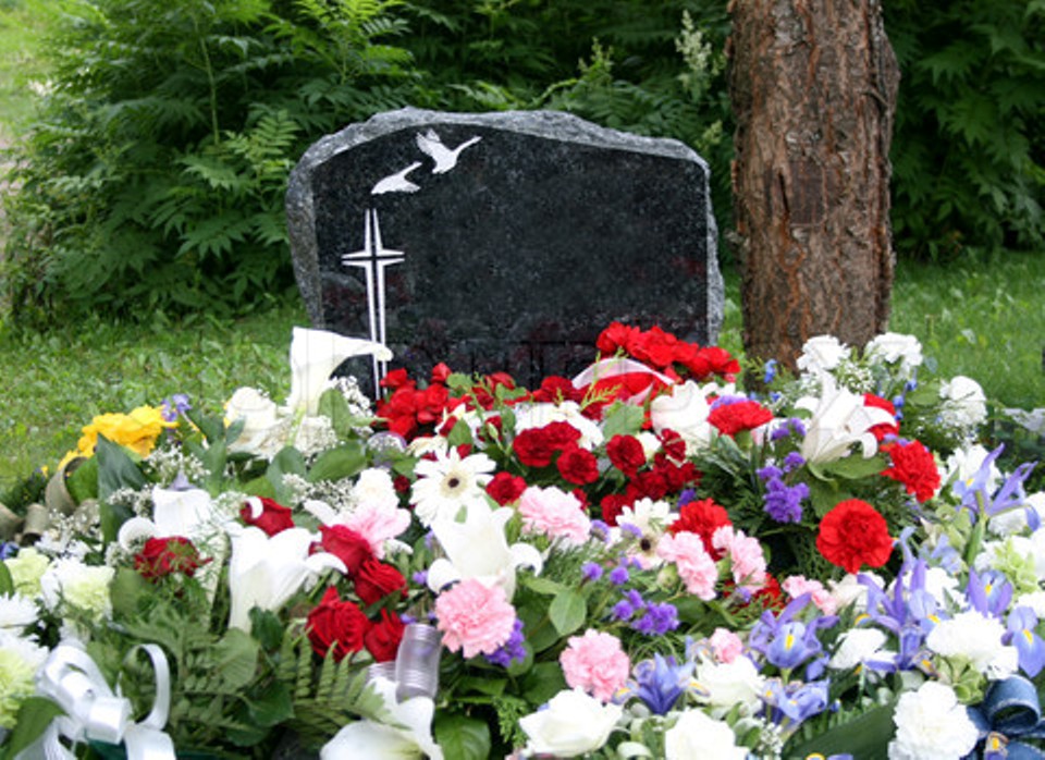 grave-with-fresh-flowers-use-this-one.jp